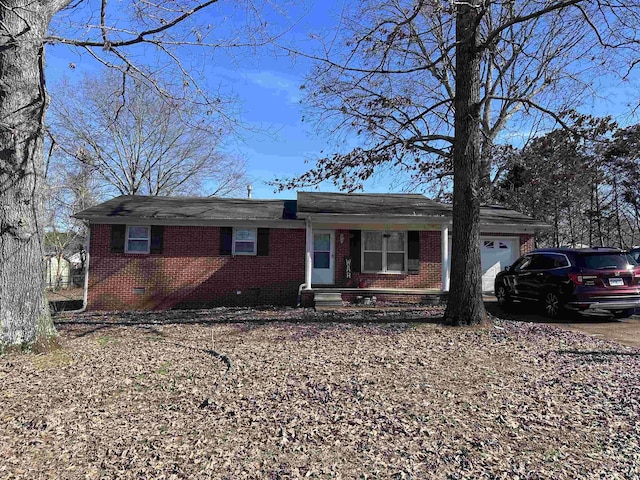 single story home with a garage