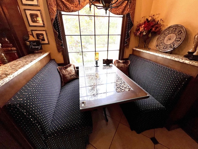 view of tiled dining space