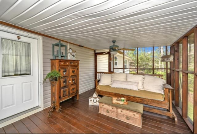 sunroom / solarium with ceiling fan