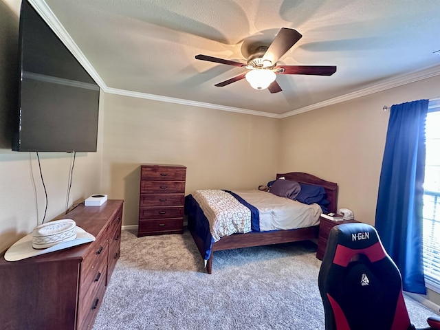  - bedroom with carpet, ornamental molding, and a ceiling fan