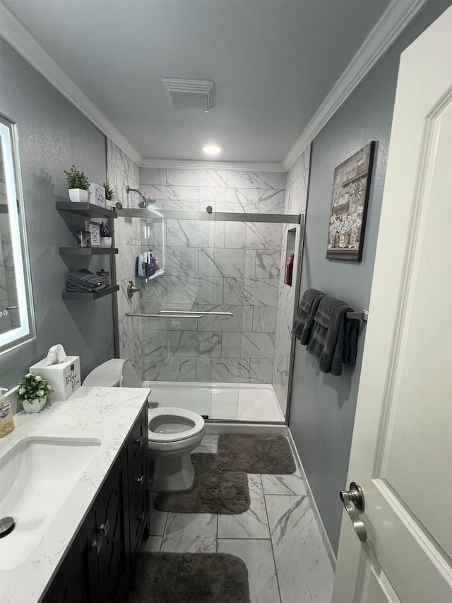  - full bathroom featuring marble finish floors, ornamental molding, toilet, vanity, and a shower stall