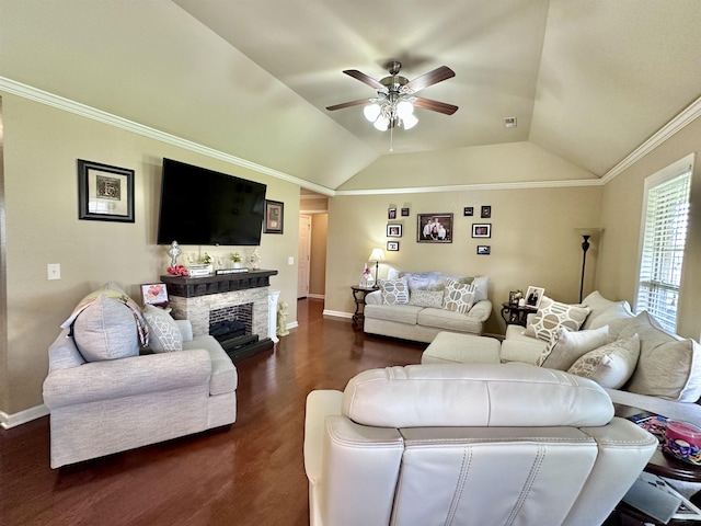  - living room with ceiling fan, dark wood finished floors, vaulted ceiling, a fireplace, and baseboards
