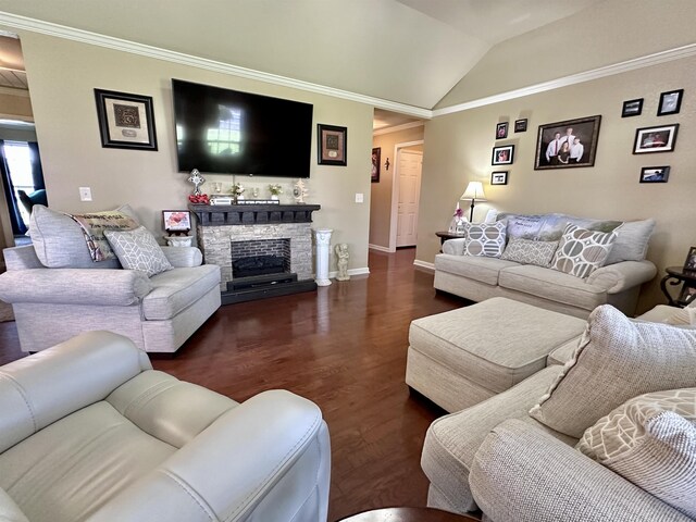  - living area featuring wood finished floors, ornamental molding, baseboards, lofted ceiling, and a fireplace