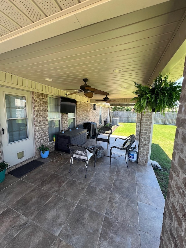  - view of patio / terrace with ceiling fan, an outdoor hangout area, grilling area, and central AC