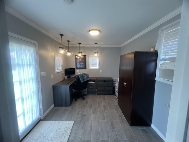  - home office with light wood-style flooring, baseboards, and crown molding