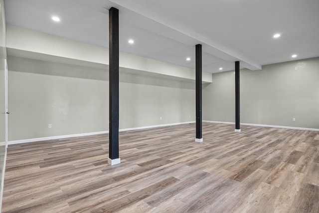 basement featuring light wood-type flooring