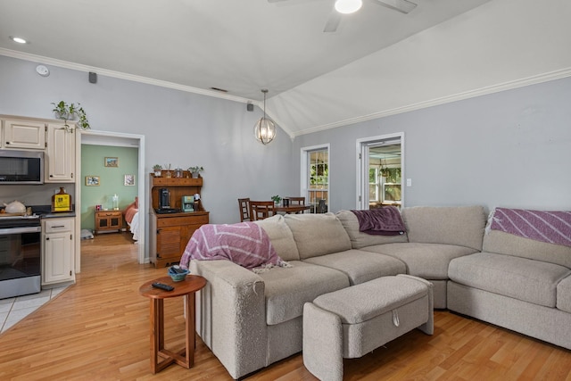  - living room with crown molding, light wood-style flooring, a ceiling fan, vaulted ceiling, and a chandelier
