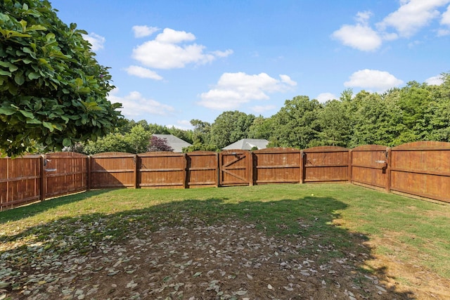  - view of yard featuring a gate
