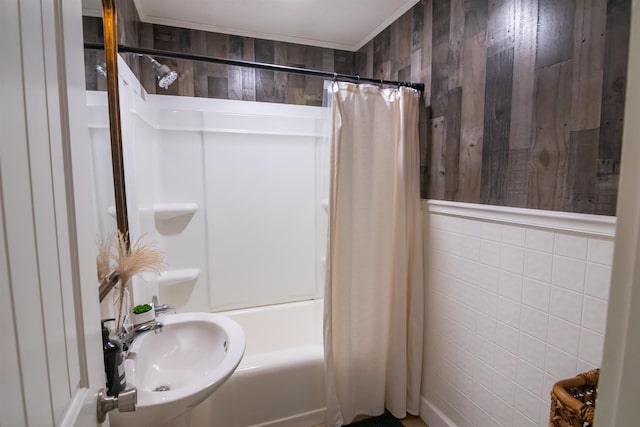  - bathroom featuring tile walls and shower / bathtub combination with curtain