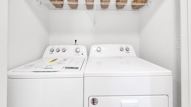  - laundry area featuring washer and clothes dryer