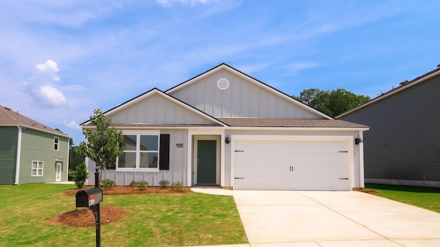  - view of front facade with board and batten siding, an attached garage, a front lawn, concrete driveway, and roof with shingles