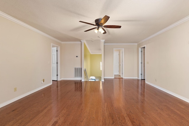 - unfurnished living room with a ceiling fan, crown molding, wood finished floors, and baseboards