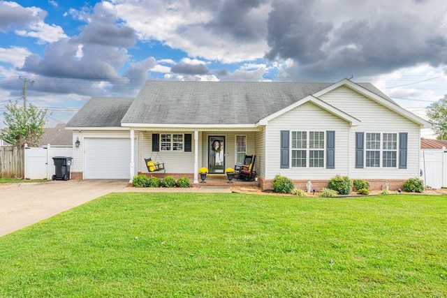 single story home featuring a garage, covered porch, and a front lawn