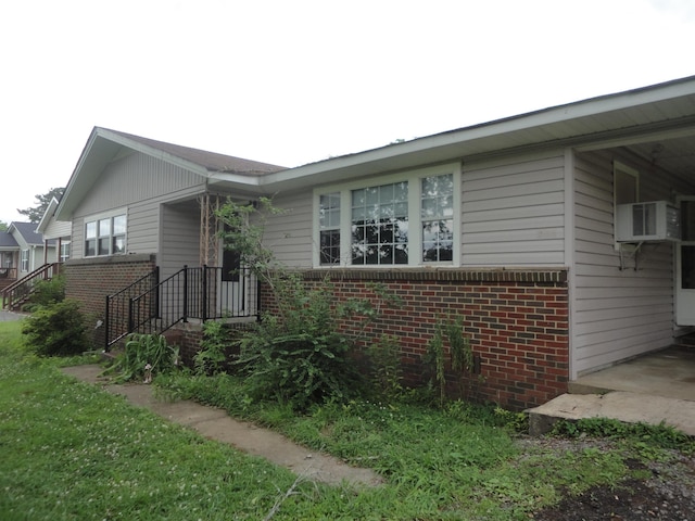  - view of front of home with brick siding