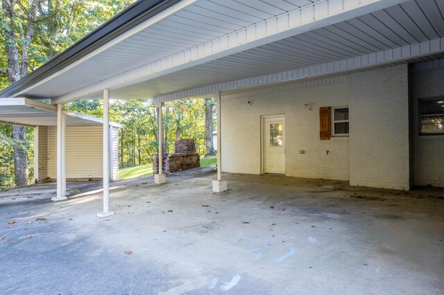 view of patio / terrace featuring a carport