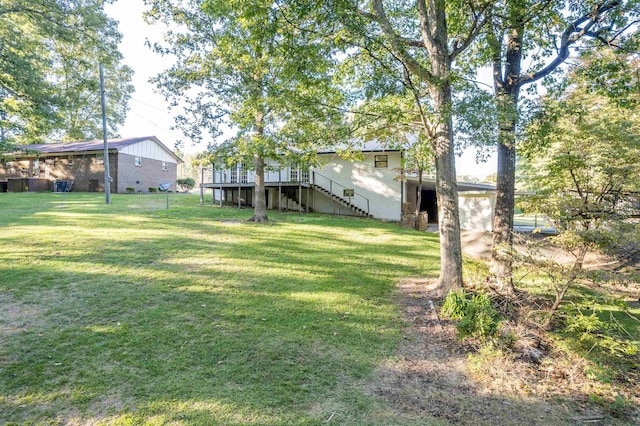 view of yard featuring a deck