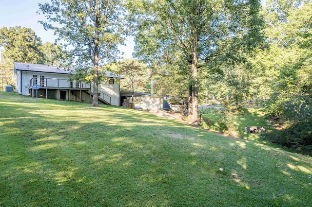 view of yard with a deck