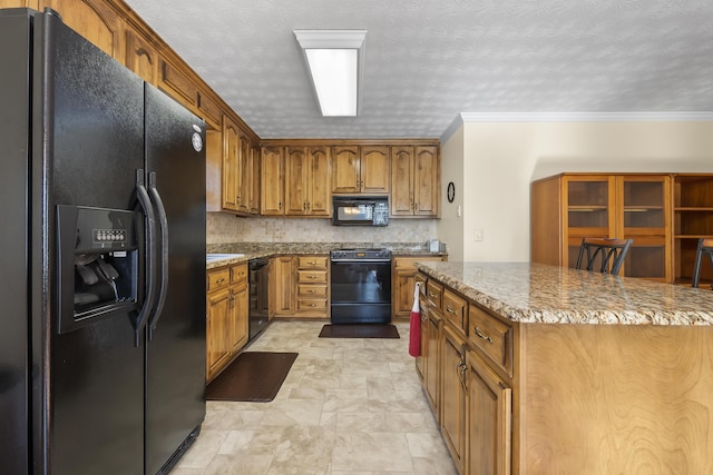 kitchen featuring black appliances, ornamental molding, backsplash, and a textured ceiling