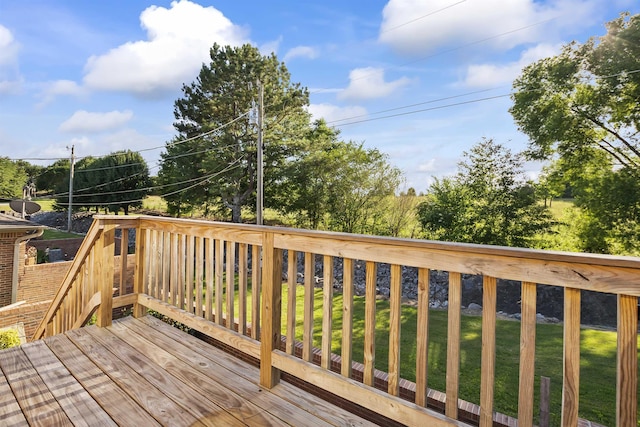 deck featuring a yard