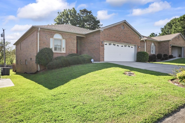 ranch-style house with central AC, a garage, and a front lawn