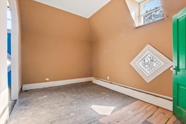 additional living space with a baseboard heating unit