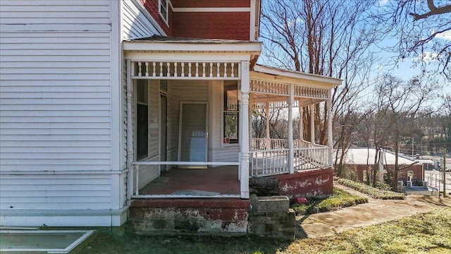 doorway to property with covered porch