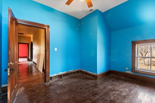 spare room with dark hardwood / wood-style floors and ceiling fan