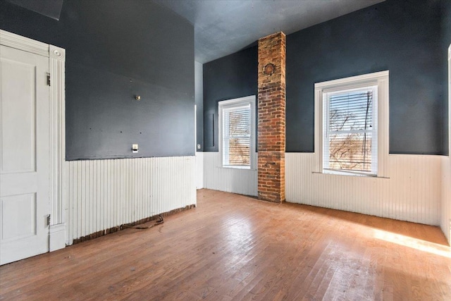 empty room featuring hardwood / wood-style flooring