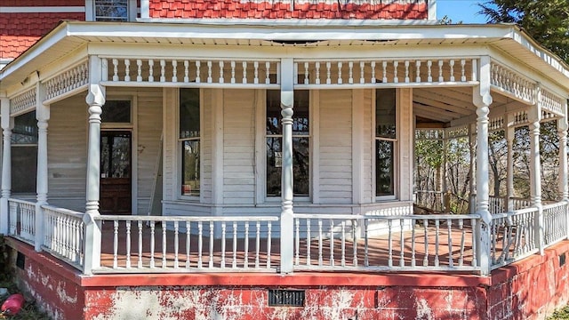 view of property exterior featuring a porch