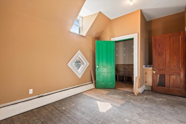 foyer featuring a baseboard heating unit