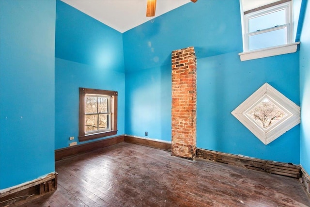 unfurnished room with ceiling fan and dark hardwood / wood-style floors