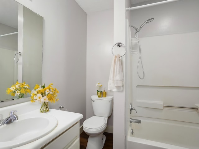 full bathroom with vanity, shower / washtub combination, and toilet