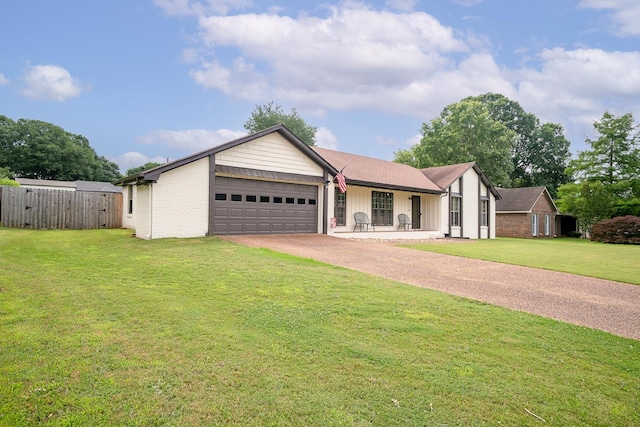  - ranch-style house featuring driveway, an attached garage, and brick siding