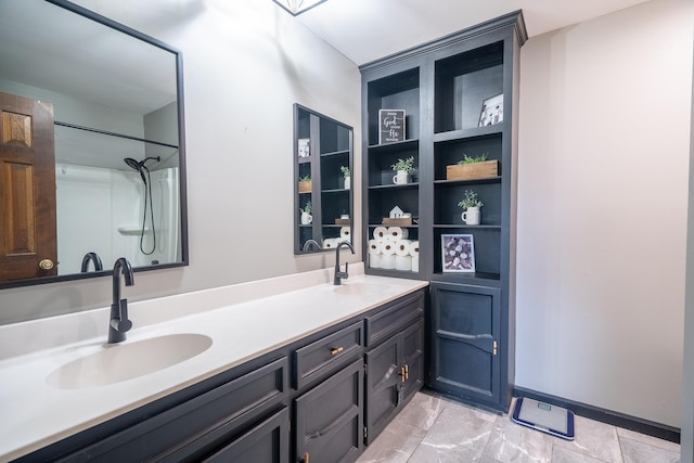  - bathroom with double vanity and a shower