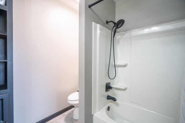  - bathroom with tile patterned floors and shower / bathtub combination
