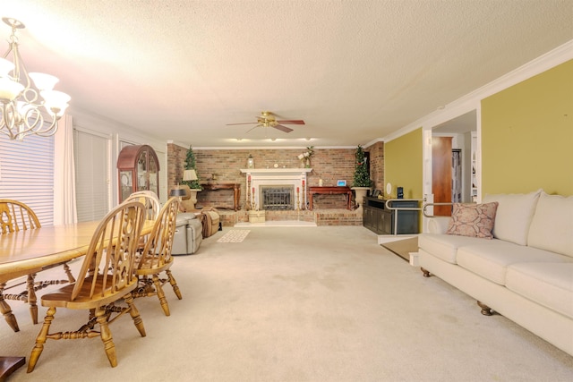 interior space with crown molding, carpet, a textured ceiling, and a fireplace