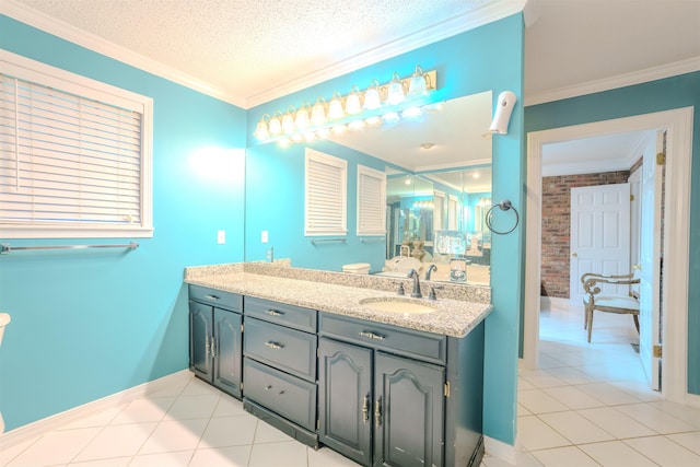 bathroom featuring vanity, tile patterned flooring, crown molding, and a textured ceiling