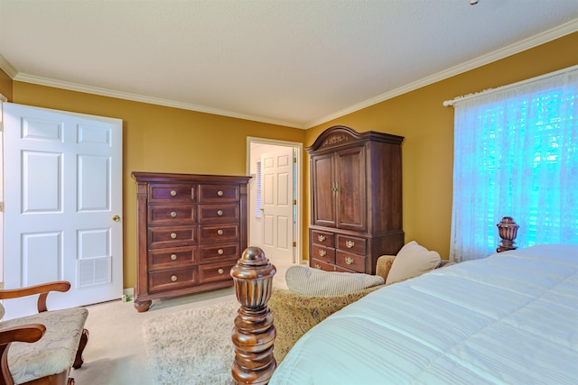 carpeted bedroom featuring crown molding