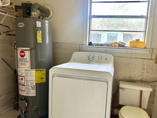 laundry room featuring washer / clothes dryer and water heater