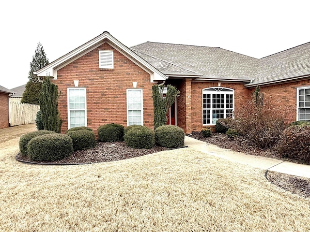 view of front of home with a front lawn