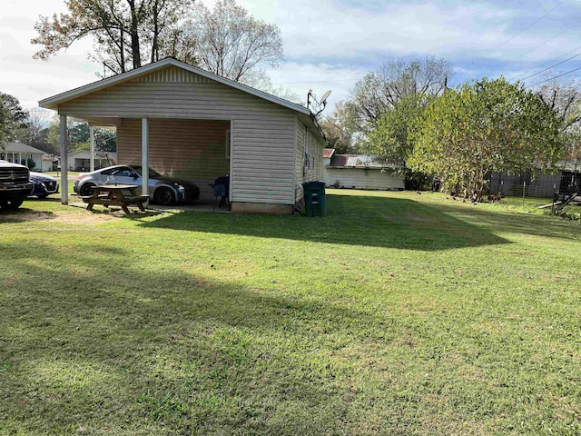 view of yard featuring a carport