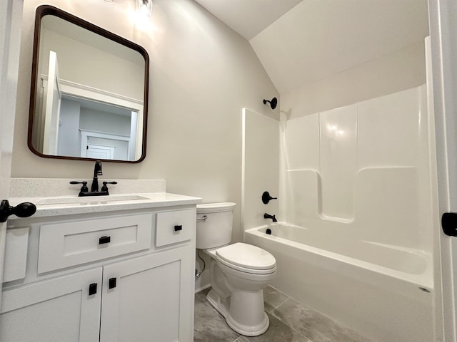 full bathroom featuring shower / washtub combination, toilet, vaulted ceiling, and vanity