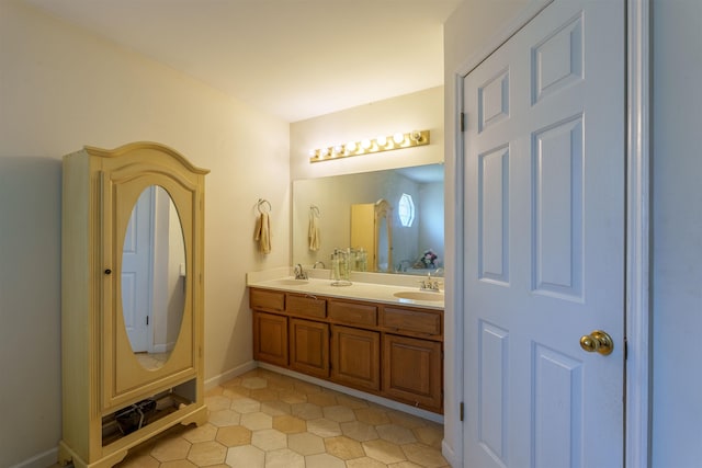  - full bath with double vanity and tile patterned floors