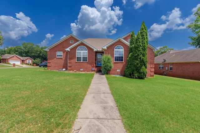 - ranch-style home with crawl space, brick siding, and a front yard