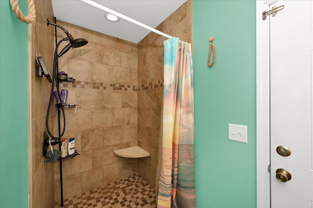 bathroom with a shower with shower curtain