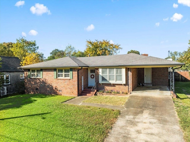 single story home featuring a front lawn and a carport