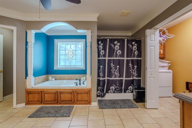 bathroom featuring shower with separate bathtub, ceiling fan, crown molding, tile patterned flooring, and washer / dryer