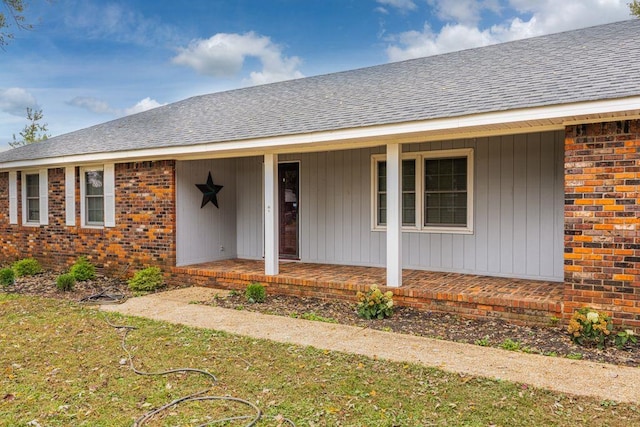 doorway to property featuring a porch