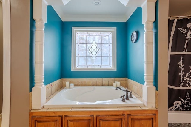 bathroom featuring a tub to relax in and crown molding