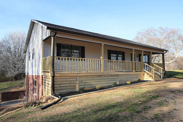 view of front of home featuring covered porch